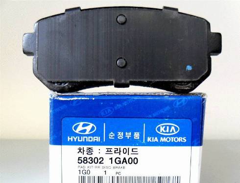 Hyundai 58302-1GA00 - Гальмівні колодки, дискові гальма autozip.com.ua
